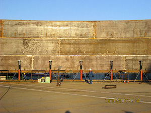 Использование установки AGW-1-D и системы гидравлических домкратов для сооружения резервуара